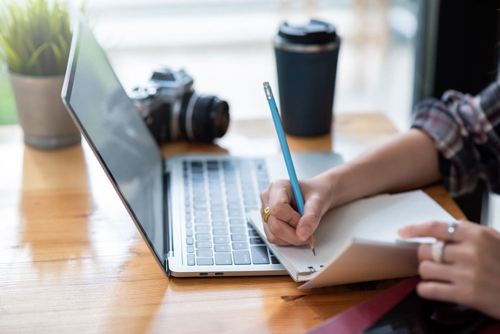 Woman taking notes